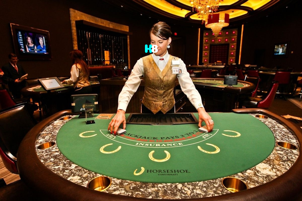 K8 casino presented on mobile device in Pakistan with slots and live games